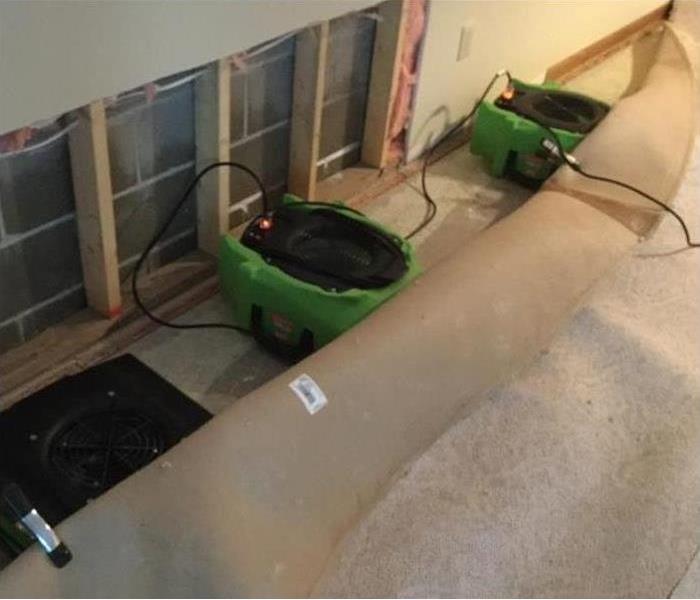 Water in basement with equipment.